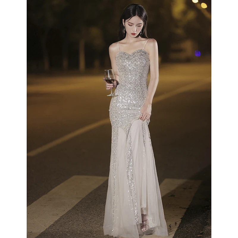 鱼尾晚礼服裙女2025新款宴会气质银色轻奢小众高端长裙吊带主持人