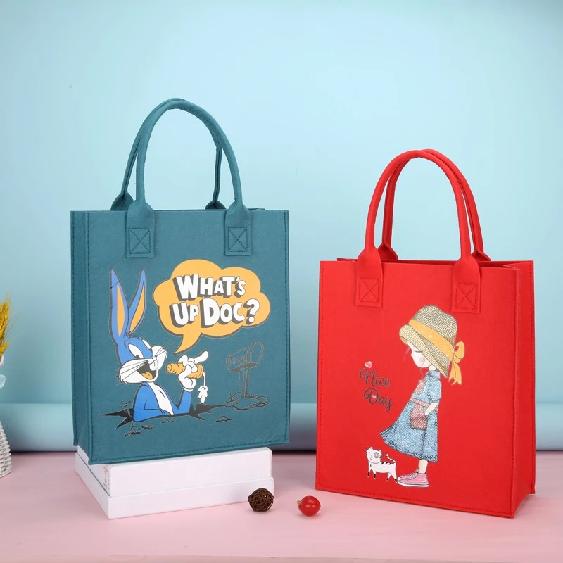 新款通用可爱毛毡包手提包卡通公仔妈咪包便当包购物袋女生小拎包