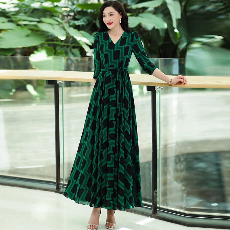 香衣丽华夏季新款花色套头中腰通勤大摆裙喇叭袖修身显瘦气质长裙