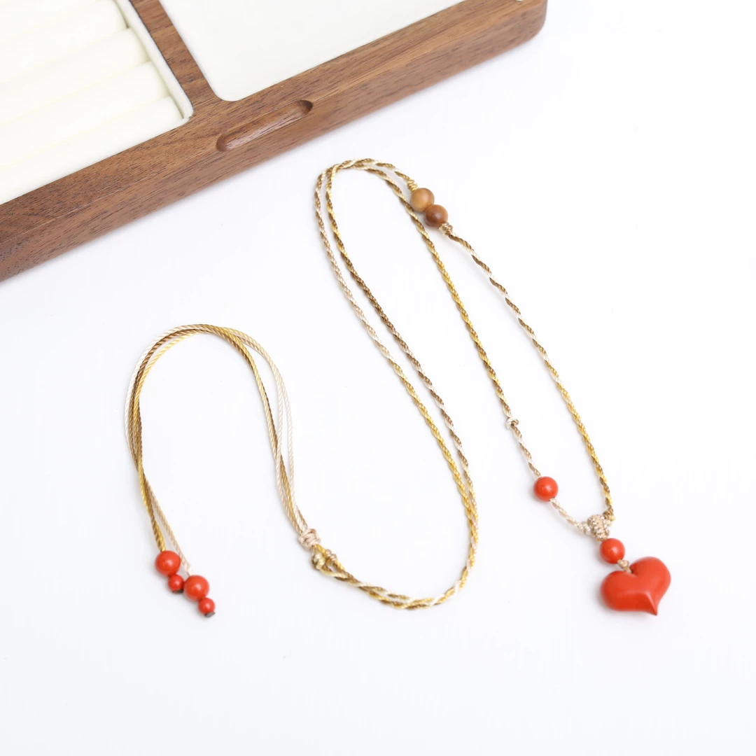 含辰砂工艺品【云边】朱砂17*8*14mm 红心吊坠（多样性发货）