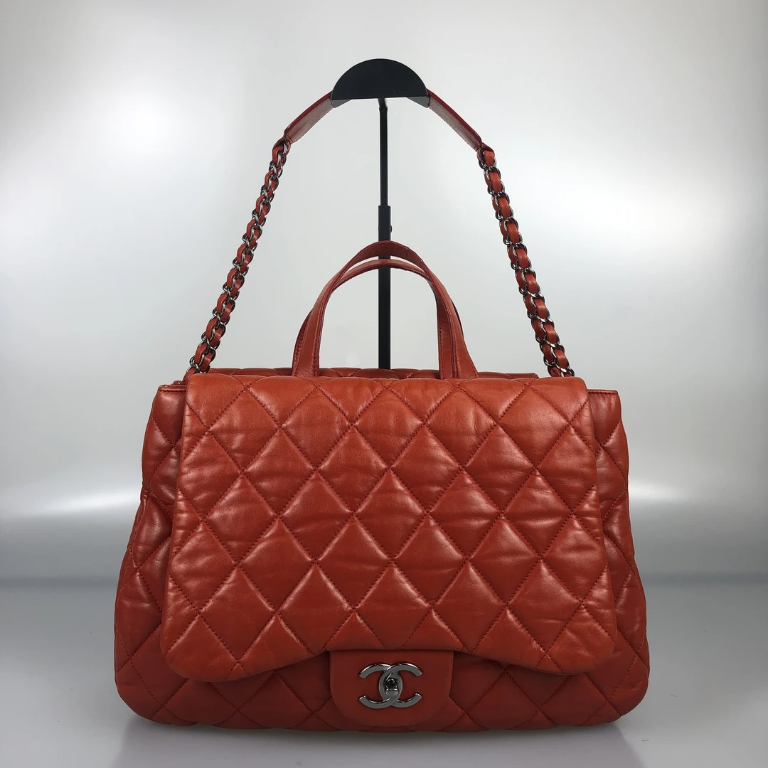95新 Chanel/香奈儿 橘红银扣泡芙双子星手提包 14开底长37