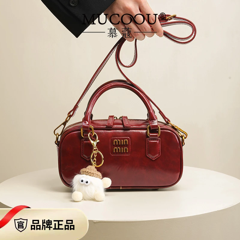 高级感气质轻奢红色包包女新款保龄球枕头包手提女包单肩斜挎包潮
