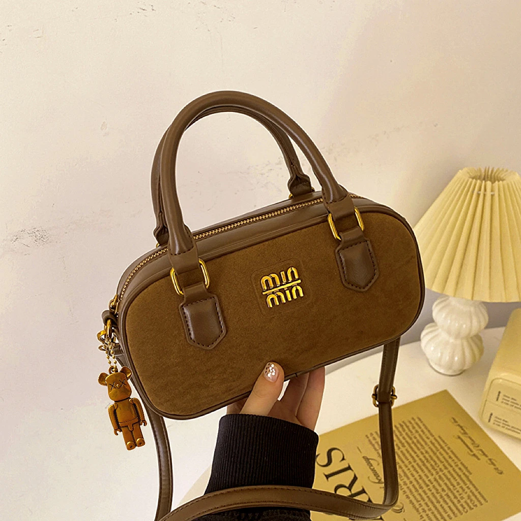 高级感复古轻奢美拉德包包女新款单肩斜挎保龄球枕头包手提女包潮