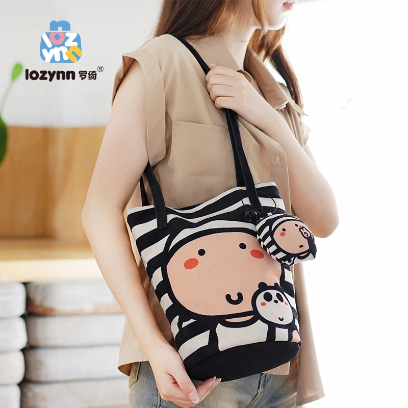 罗绮 x小蔻 新款潮时尚水桶包单肩包高级感女包肩带水桶包