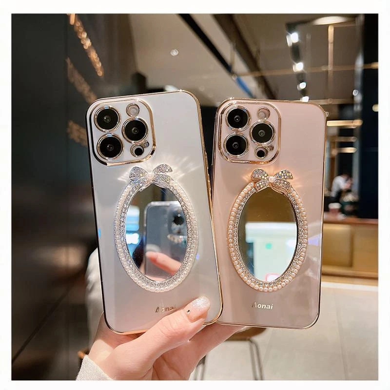 网红女款电镀蝴蝶结补妆镜手机壳适用苹果 iPhone15promax水钻珍