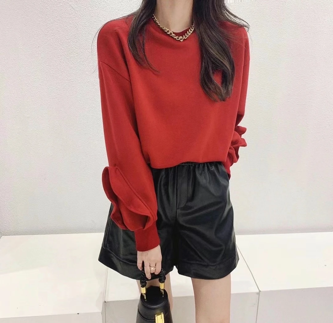 乐缘秋季新款韩版时尚显瘦圆领袖子木耳边纯色卫衣*0926