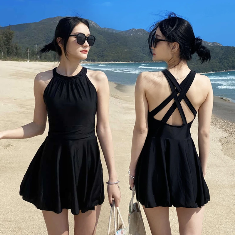 泳衣女连体黑色性感保守气质纯色连衣裙式泳装时尚美背修身游泳衣