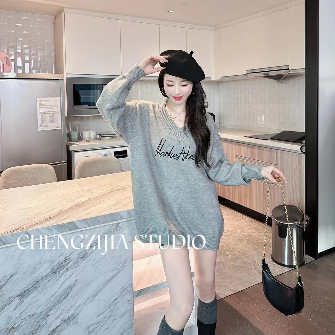 MY0197纯欲风性感露肩挂脖毛衣两件套