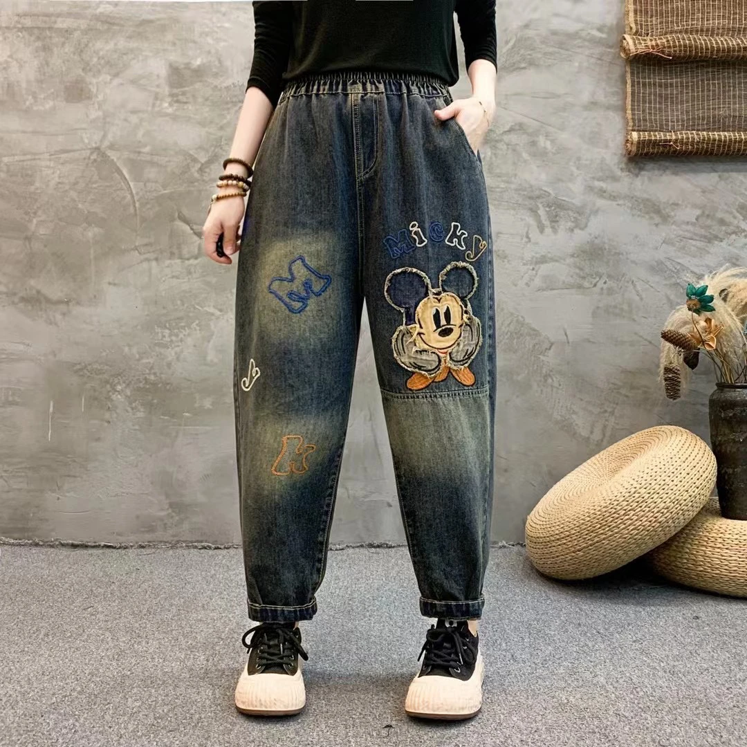 宽松牛仔哈伦裤女秋季新款大码松紧腰牛仔裤卡通刺绣裤子