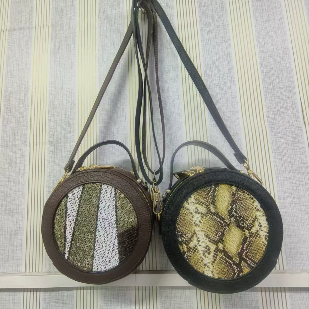 牛皮小圆鼓斜跨包