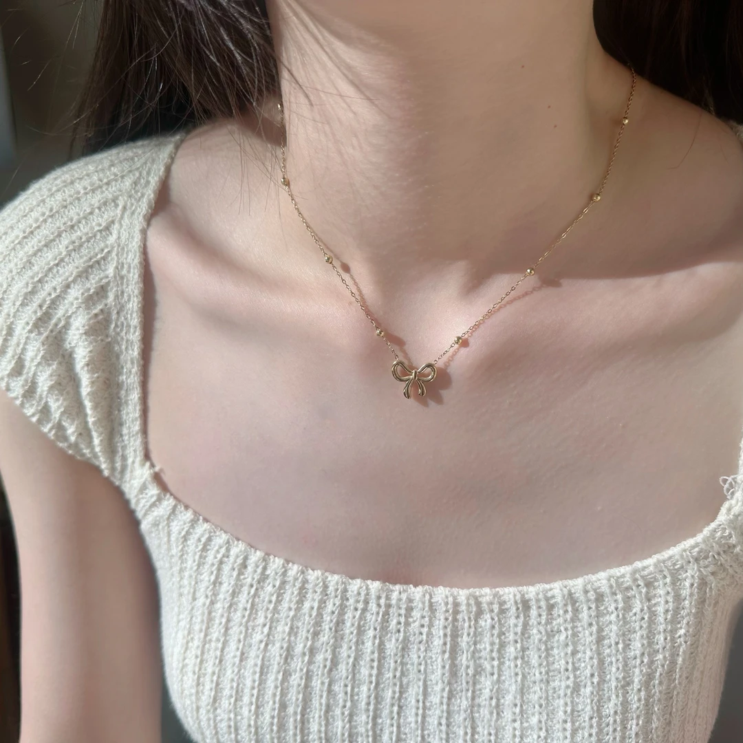 钛钢项链 8668镂空蝴蝶结珠珠链精致锁骨链轻奢不掉色ins小众百搭