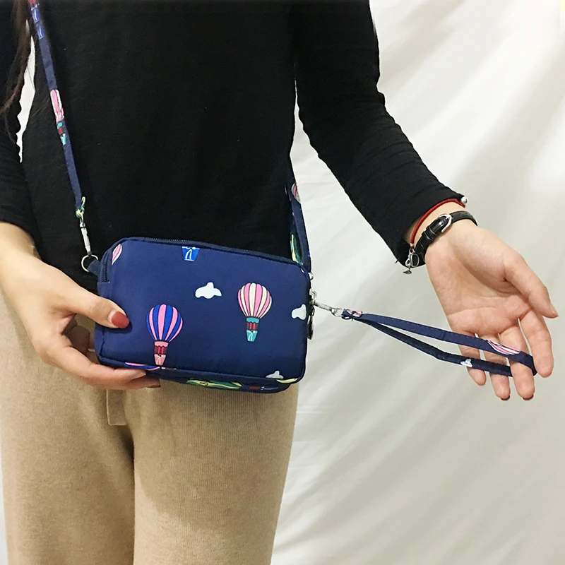 (867)三层印花斜挎手机包迷你小包包女百搭手拿钱包防水手腕单肩