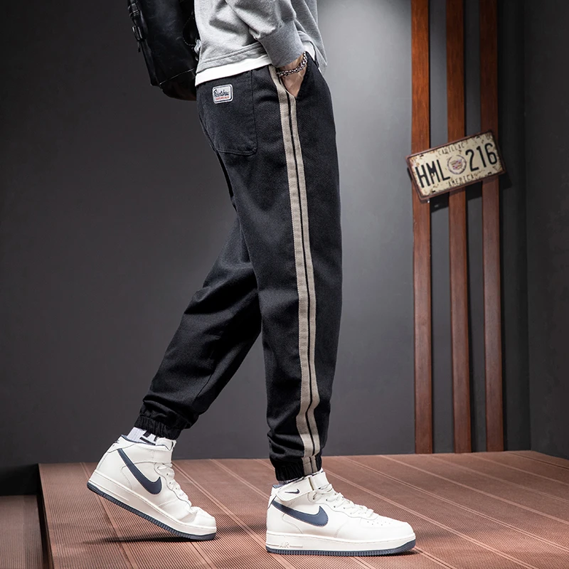 牛仔裤男2022春秋季新款束脚裤韩版潮流休闲帅气牛仔长裤子