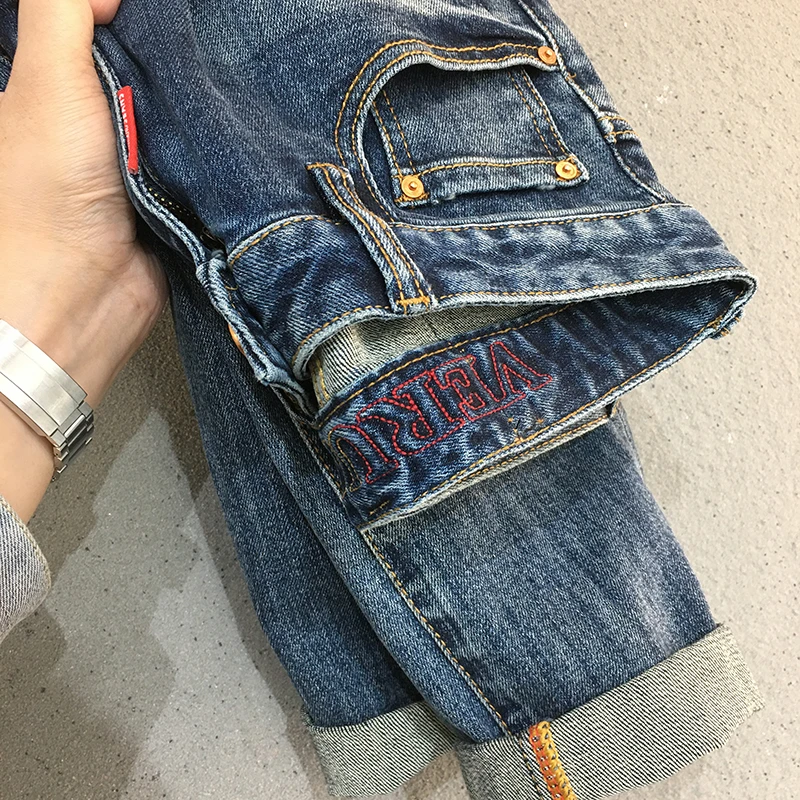 258-春夏款复古做旧牛仔裤男潮牌修身合体直筒潮流百搭刺绣长裤