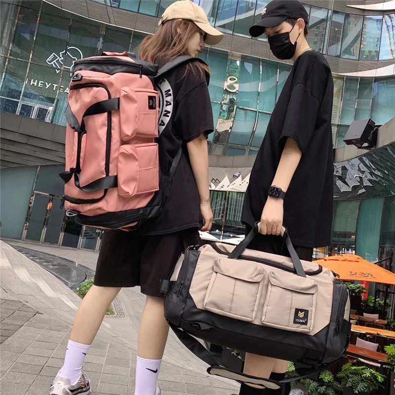 新款时尚多用健身旅行包男士斜跨大包大容量双肩包女手提登山包潮