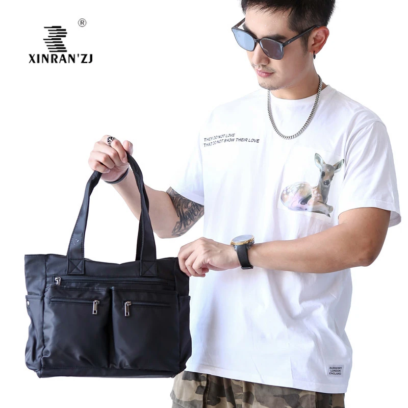 多拉链口袋轻便防水男士中小型手提单肩包饭盒化妆包学生肩挎书包