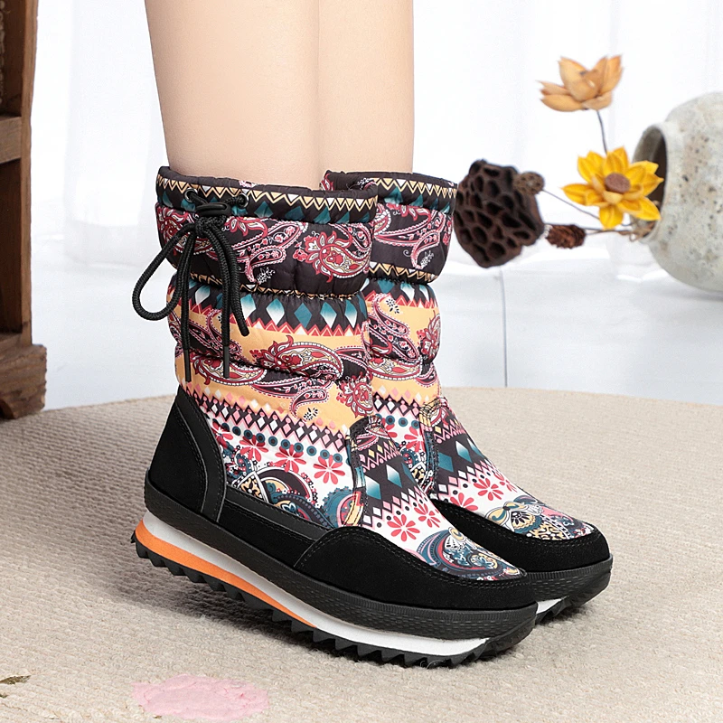 冬季新款加绒雪地靴女中筒防水防滑棉鞋保暖民族风高筒加厚底长靴