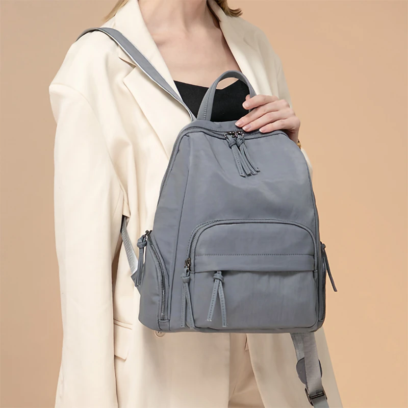 小众防水双肩包女士简约时尚牛津布防盗背包大容量轻便旅行包休闲