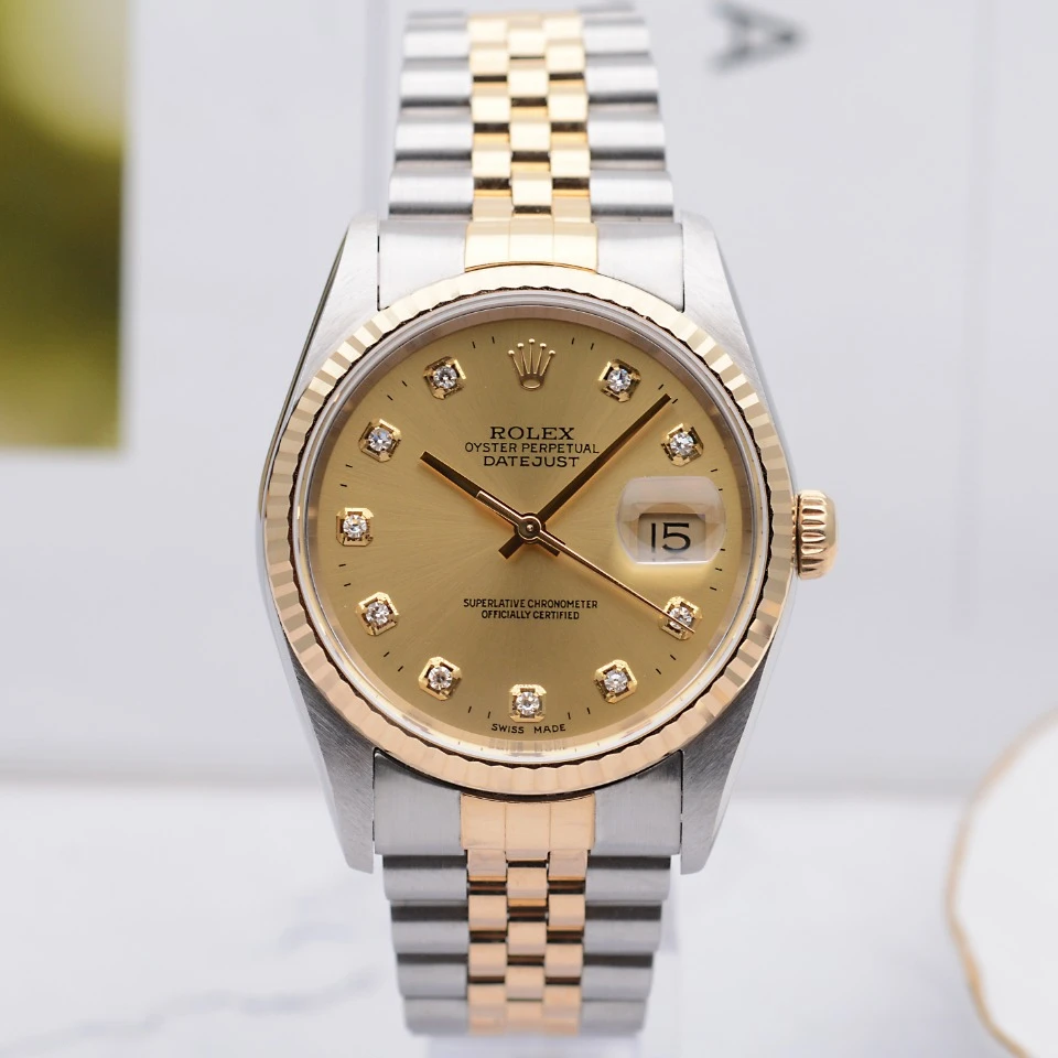 99新 Rolex/劳力士 爱换日志16233香槟盘间金后钻36mm自动机械