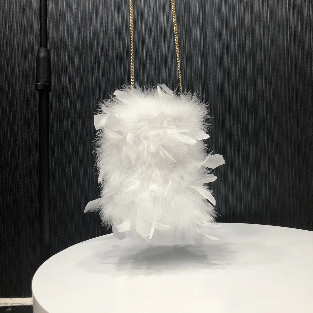 真羽毛真皮草手机包