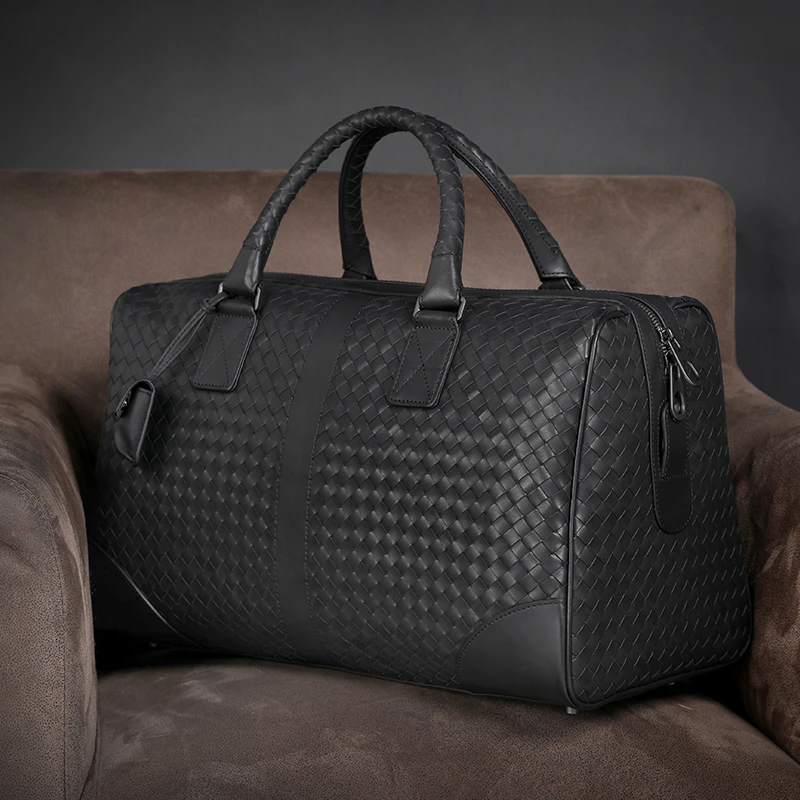 久鲤男士头层牛皮轻便商务旅行包时尚休闲潮流大空间容量旅行包