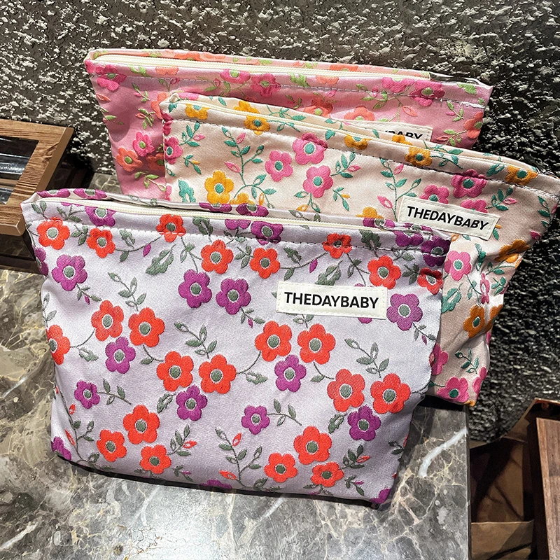 新款大容量互补色花儿朵朵化妆包小花紫色文艺随身便携帆布收纳袋