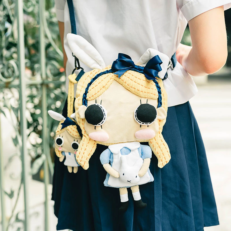 原创小众设计可爱娃娃放手机斜挎流行迷你包包女ins2021新款潮