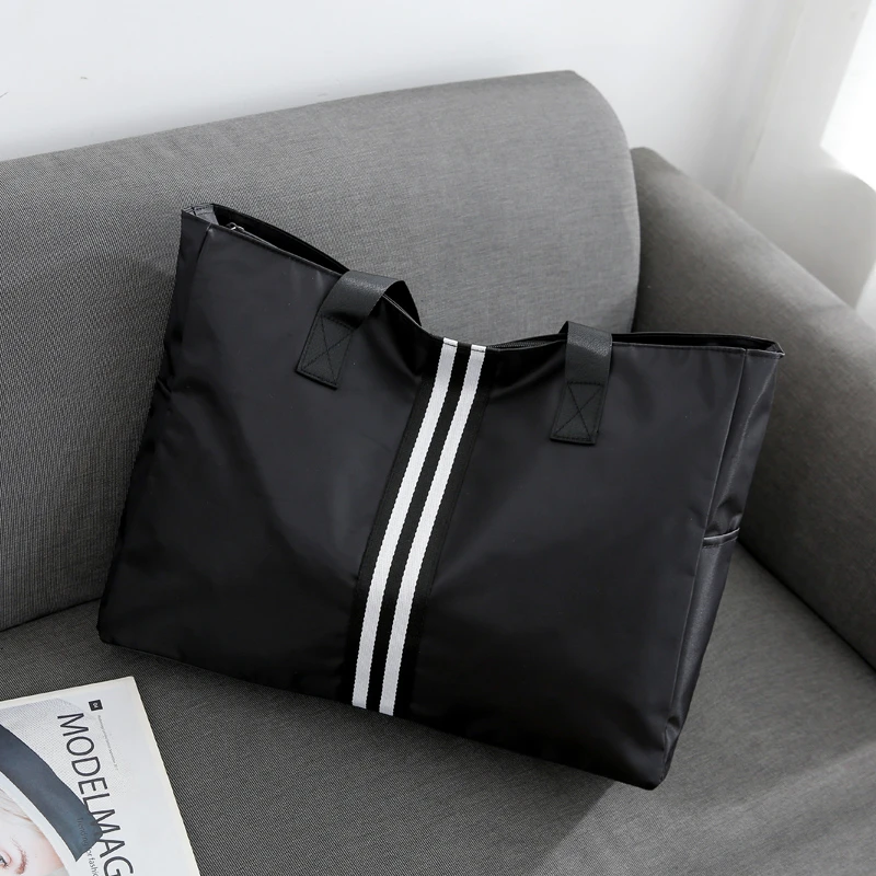 手提女短途行李包简约包网红单肩旅行袋牛津布健身包旅行包男出差