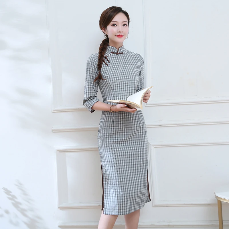 少女年轻款现代文艺蚀骨中长格子改良版连衣裙秋冬旗袍2024年新款